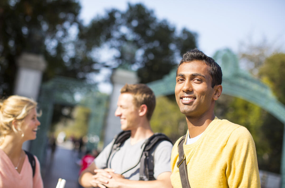 Student in front of Sather Gate