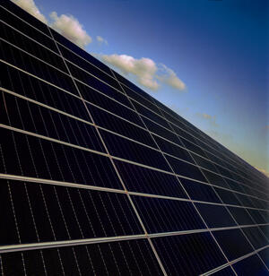 solar panels against a blue sky