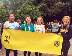 UC Berkeley students holding Under Armour sponsored yoga mat